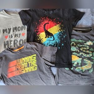 (4) shorts sleeve shirts Boys size 6/7